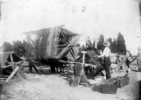 Ross, Frank drying nets on eastside of river Earl M. Siddall collection