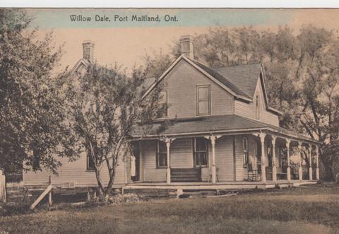 Willow Dale East Port Maitland Lizzie McCane standing in the door. Wm A. Warnick Postcard collection